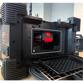 A Bosch Professional tool with a red battery in a black casing.